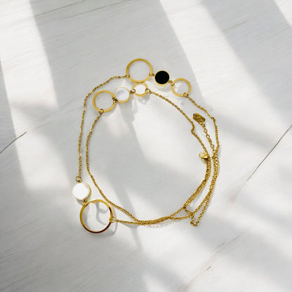 Long Gold-Colored Necklace with Circle and Mother of Pearl Pendant